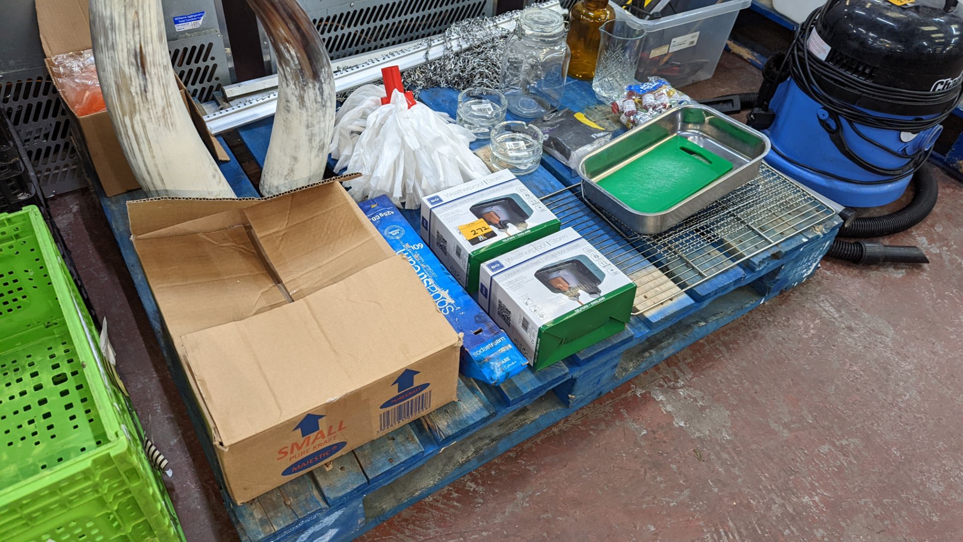 The contents of a pallet of assorted items including paper bags, weatherproof sockets, ornamental it - Image 7 of 8