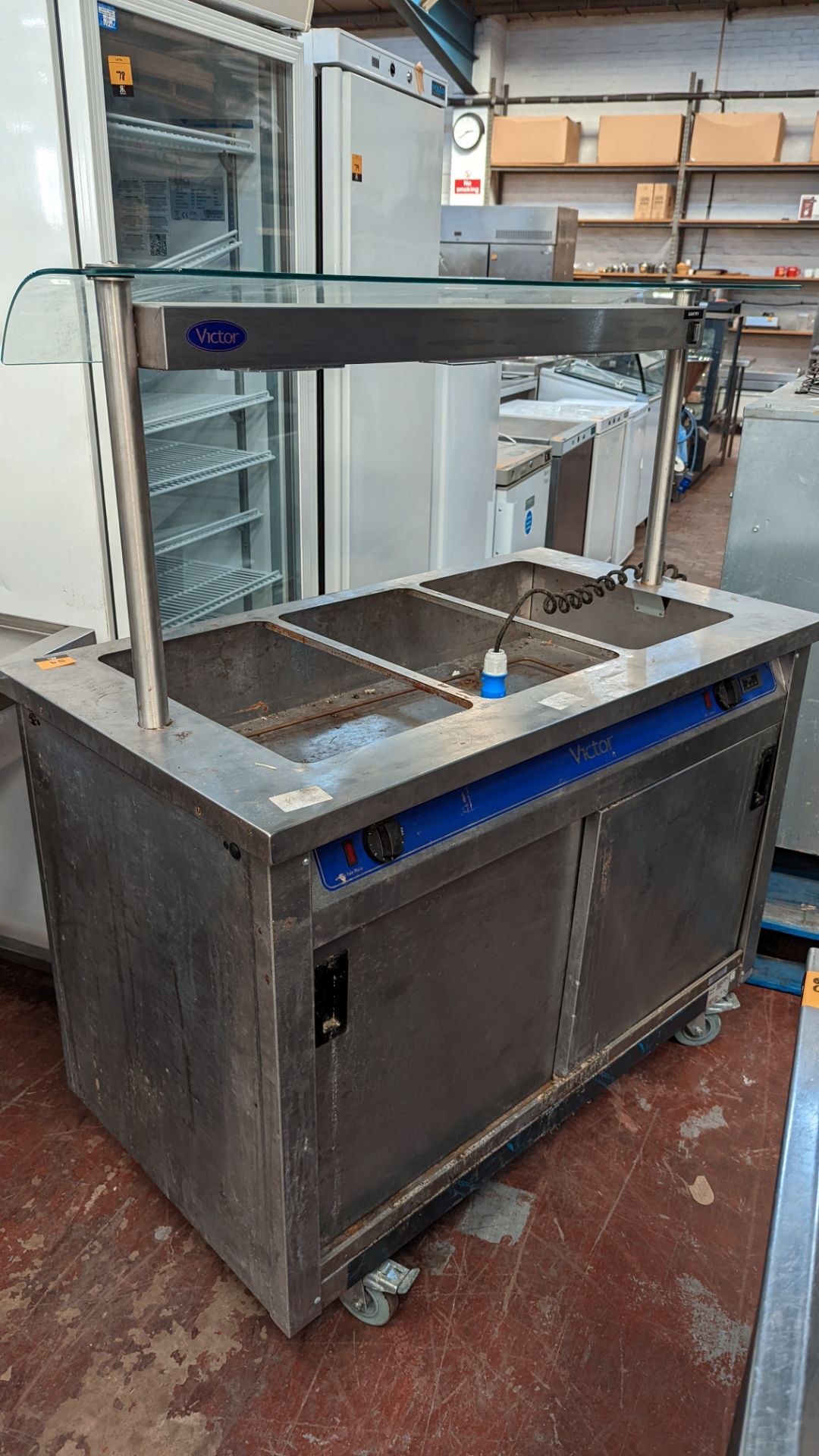 Stainless steel mobile warming/serving unit