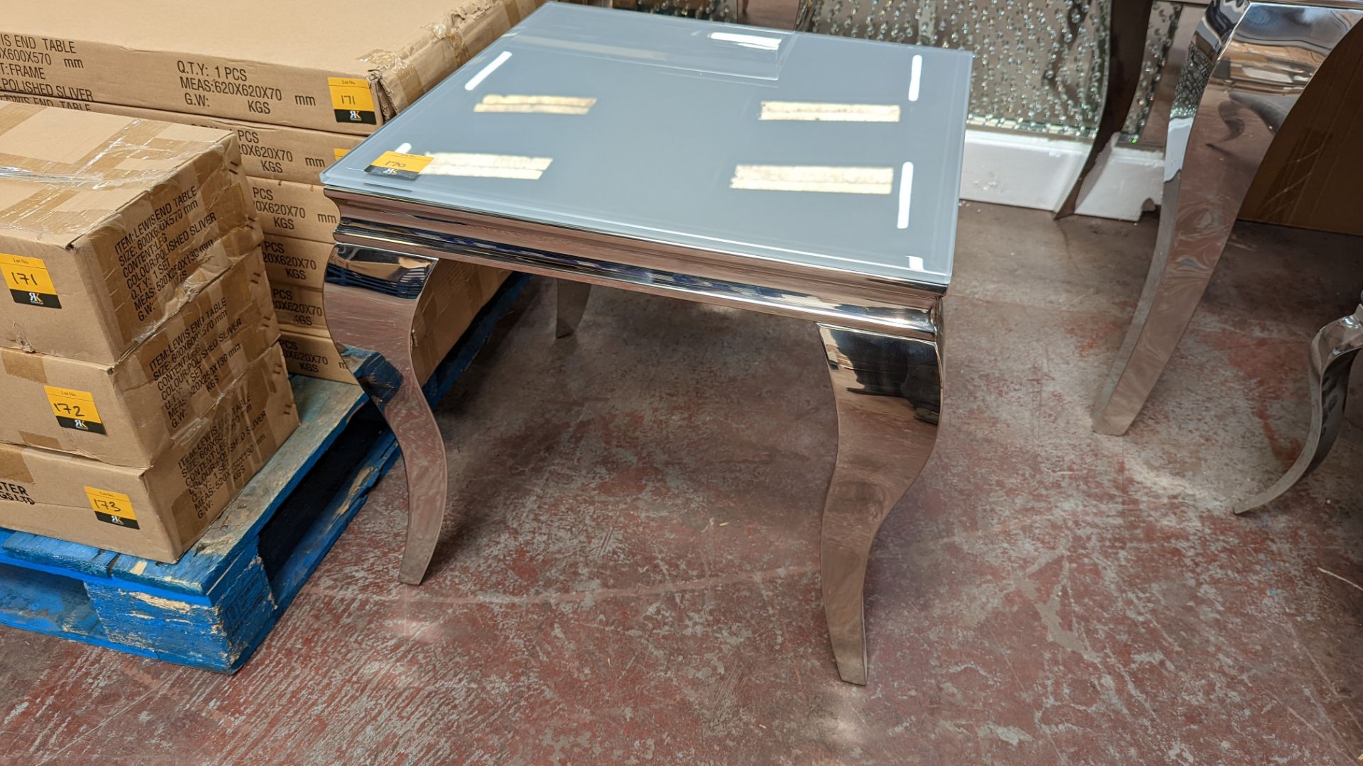 Occasional table comprising opaque glass top measuring circa 60cm square, on silver frame/legs. NB1