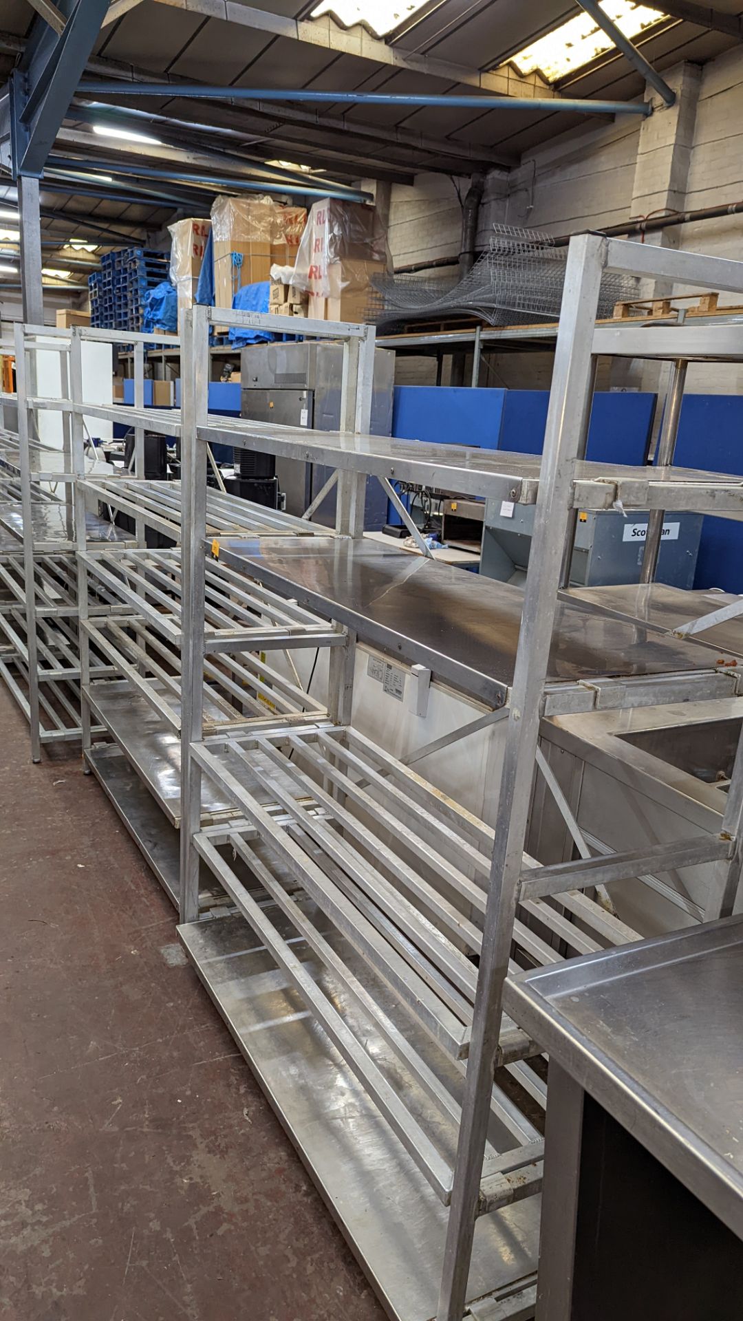 2 freestanding bays of cold store shelving, each being approx. 148cm wide, one with 5 shelves & one