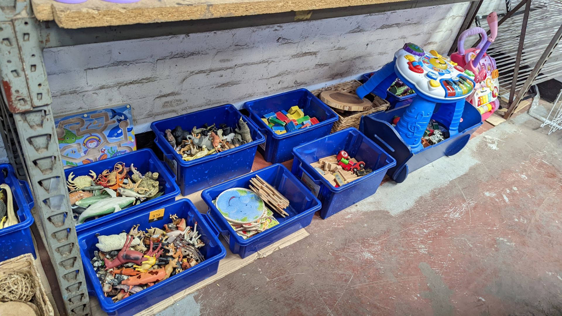 Contents of a bay of children's toys - all crates included