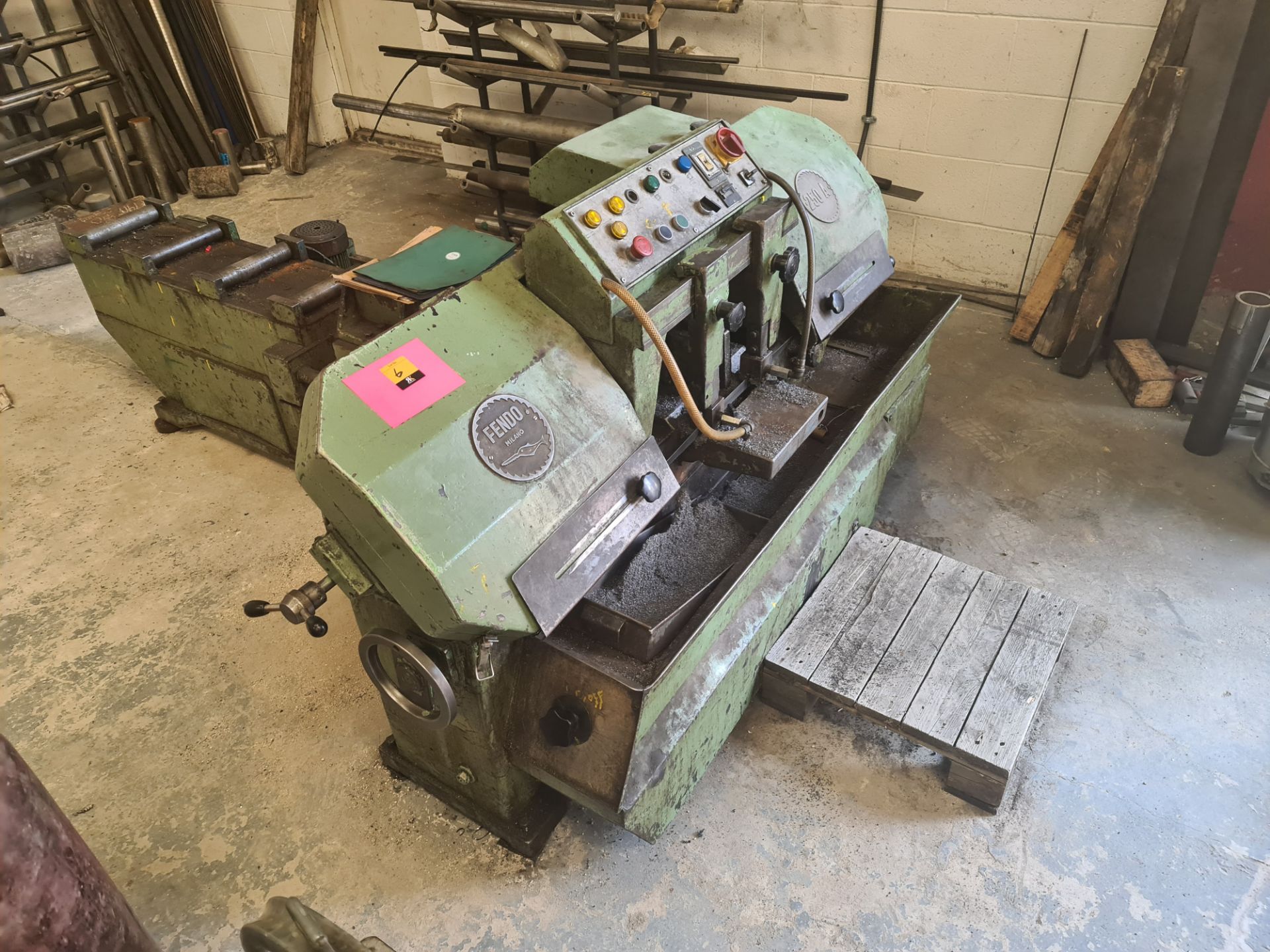 Fendo model 250A automatic horizontal band saw including feeder affixed to the rear of same
