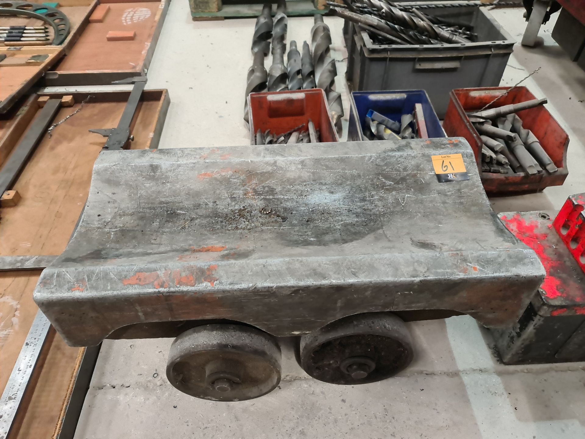 Bar trolley. This trolley is used for wheeling heavy bar stock around the factory