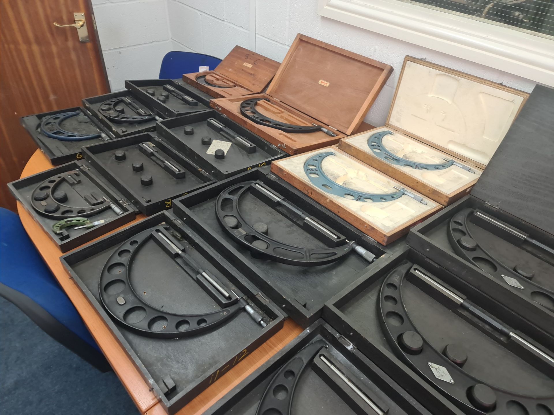 Large quantity of micrometers, callipers & other measuring equipment comprising trolley & contents.