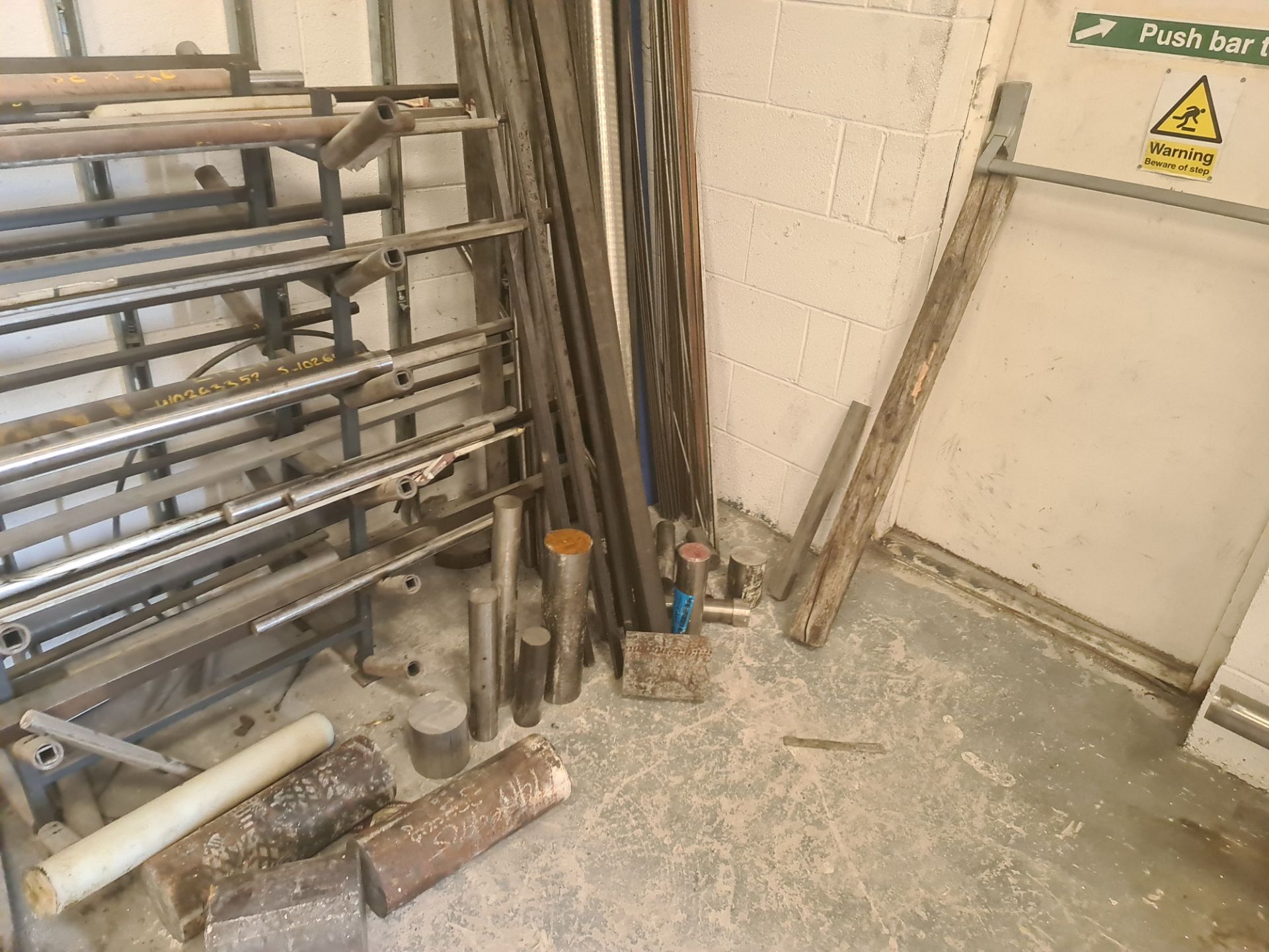 Quantity of rod & bar stock comprising 2 stands & their contents plus the loose metal located adjace - Image 4 of 18