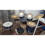 CB Drums drumkit comprising bass drum with pedal which includes 2 drums mounted to top of same, 2 ad