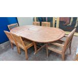 Outdoor dining suite comprising extending table (2.5m x 1.2m), 4 regular chairs & 2 carvers