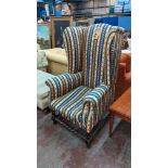 Early 20th century Georgian style high wingback chair with stained barley twist legs & stretcher, re