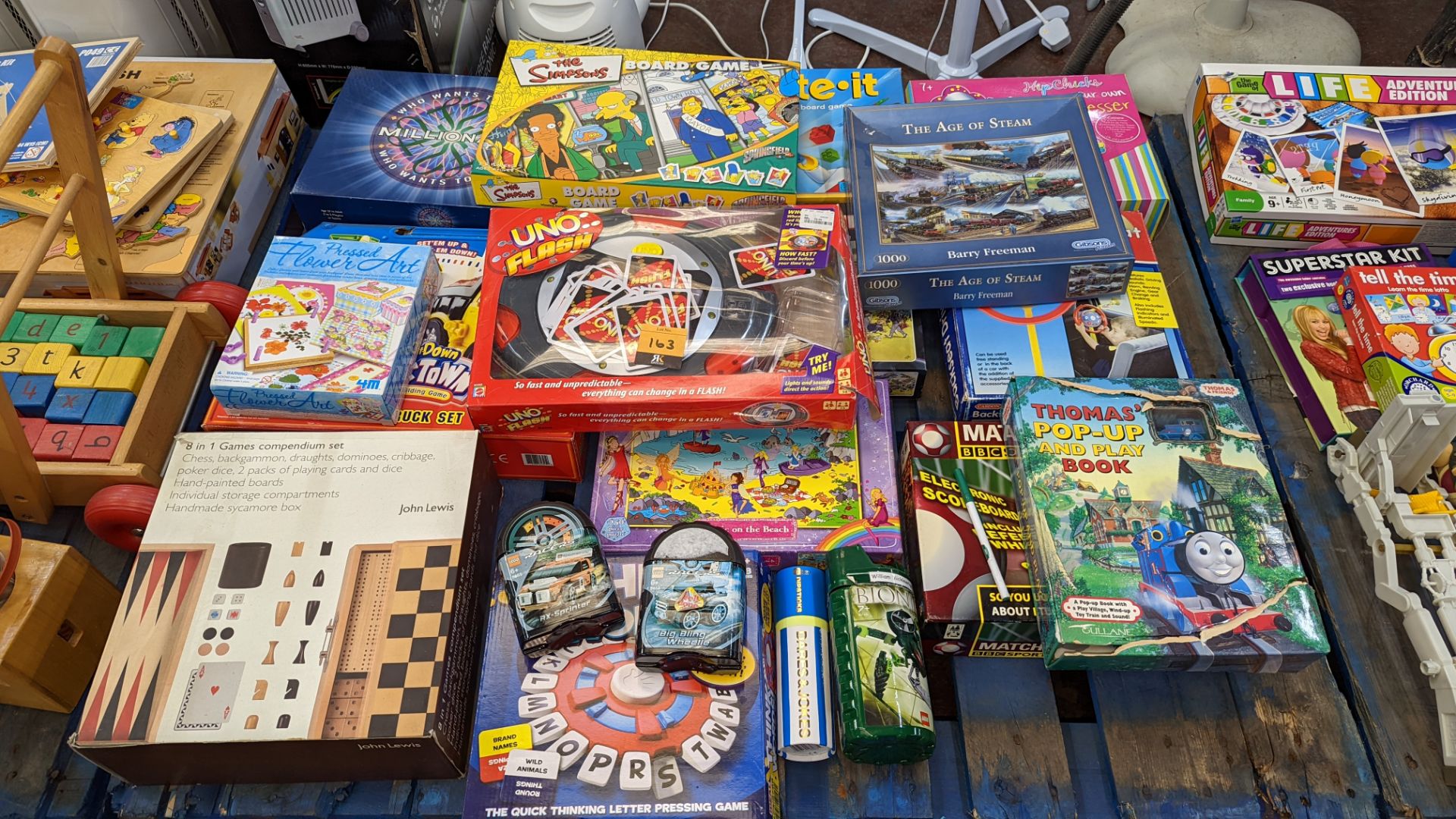 The contents of a pallet of children's & adults boardgames