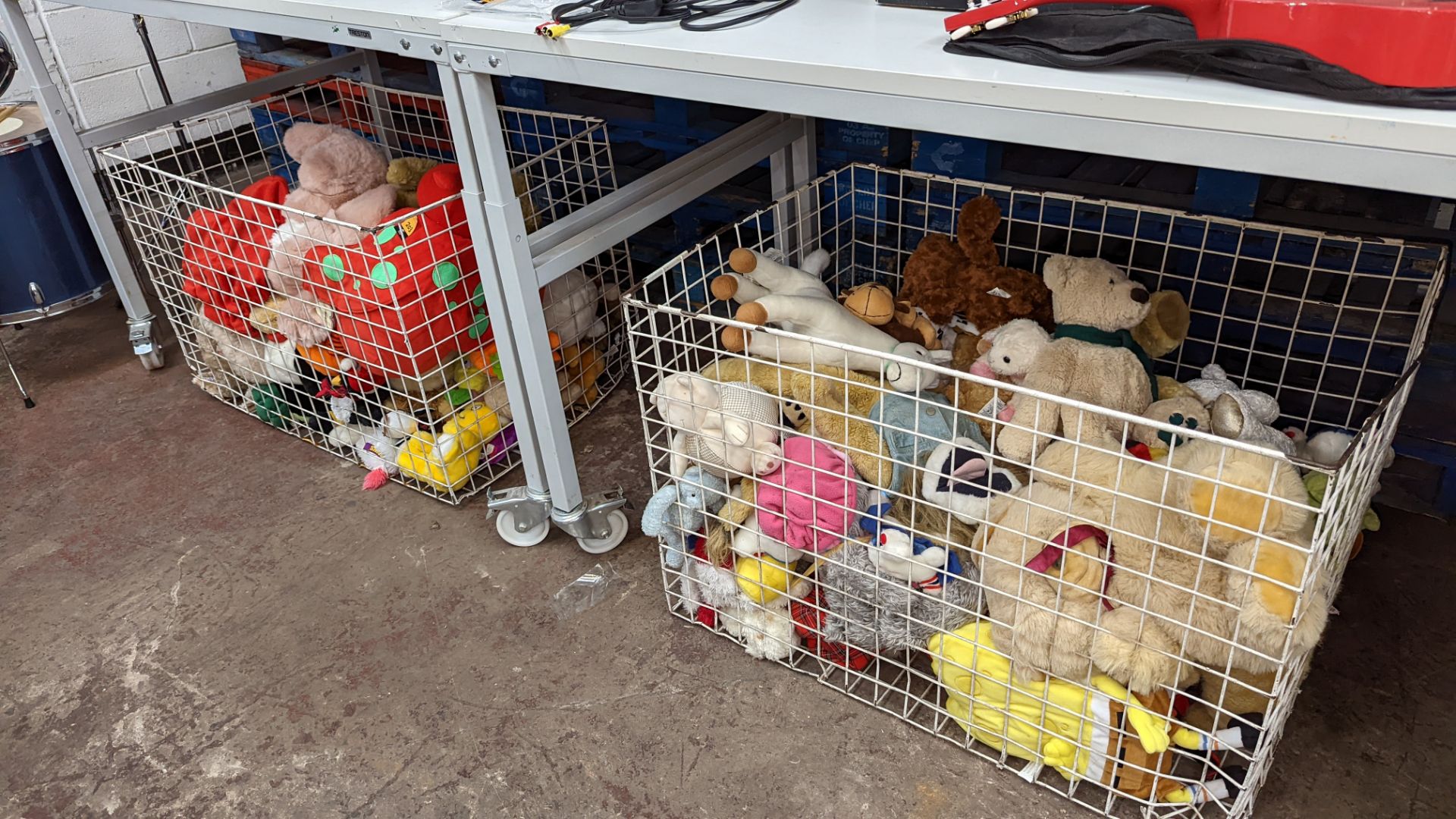 The contents of 2 very large cages of soft toys. NB cages excluded
