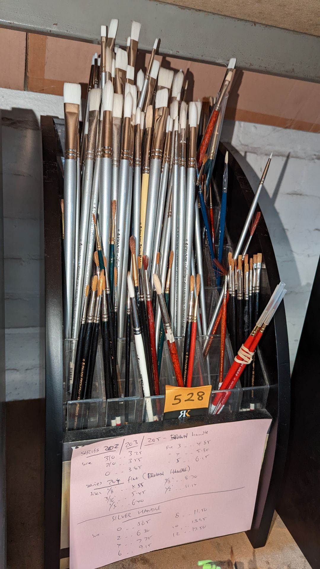 Quantity of paintbrushes comprising stand & contents