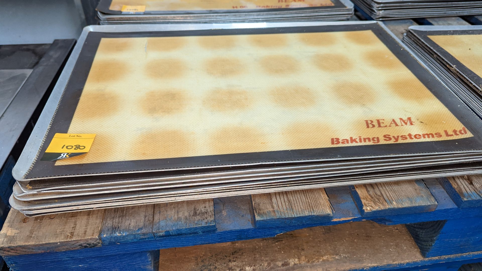 10 large rectangular baking sheets, each measuring approx. 600mm x 400mm, many of which include a Fi - Image 2 of 3