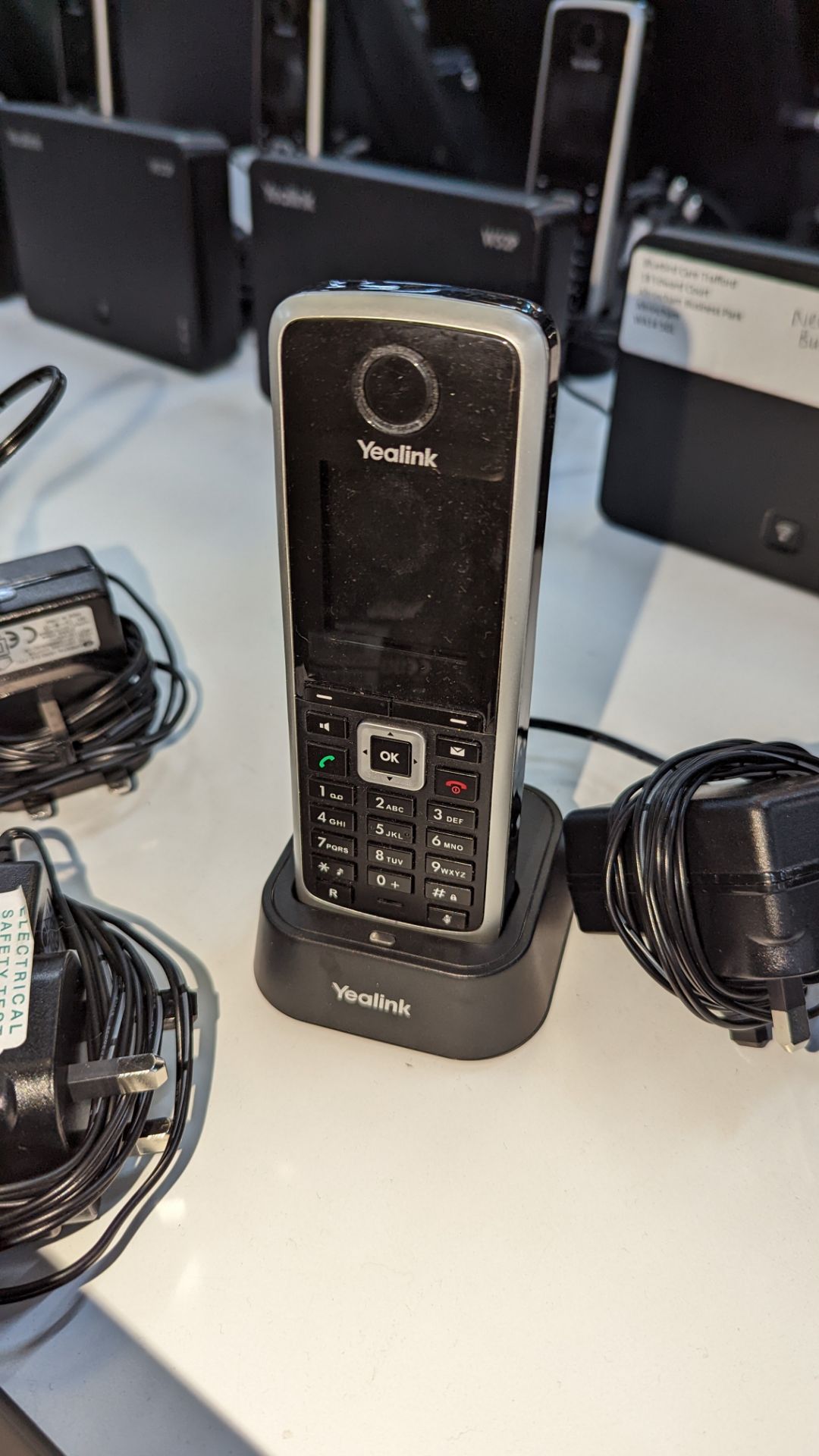 4 off Yealink model W52P wireless deck telephone handsets, each handset including a base station wit - Image 7 of 7