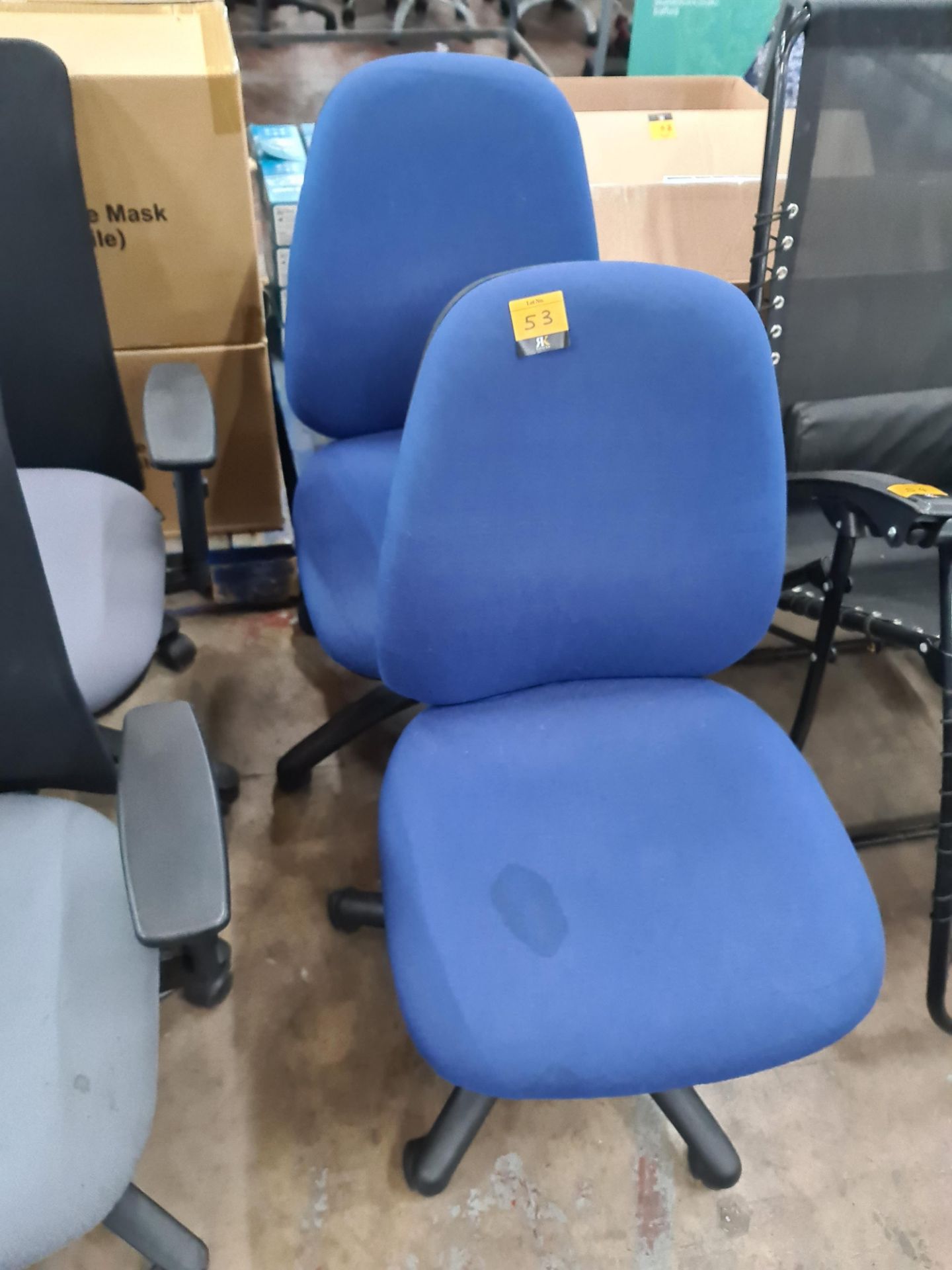 2 off blue operator chairs.