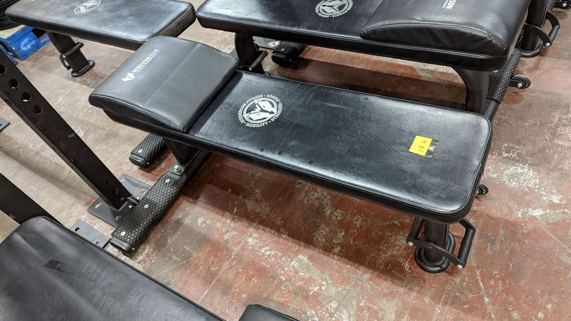 Wolverson padded gym bench, including wheels for easy mobility plus removable padded head rest
