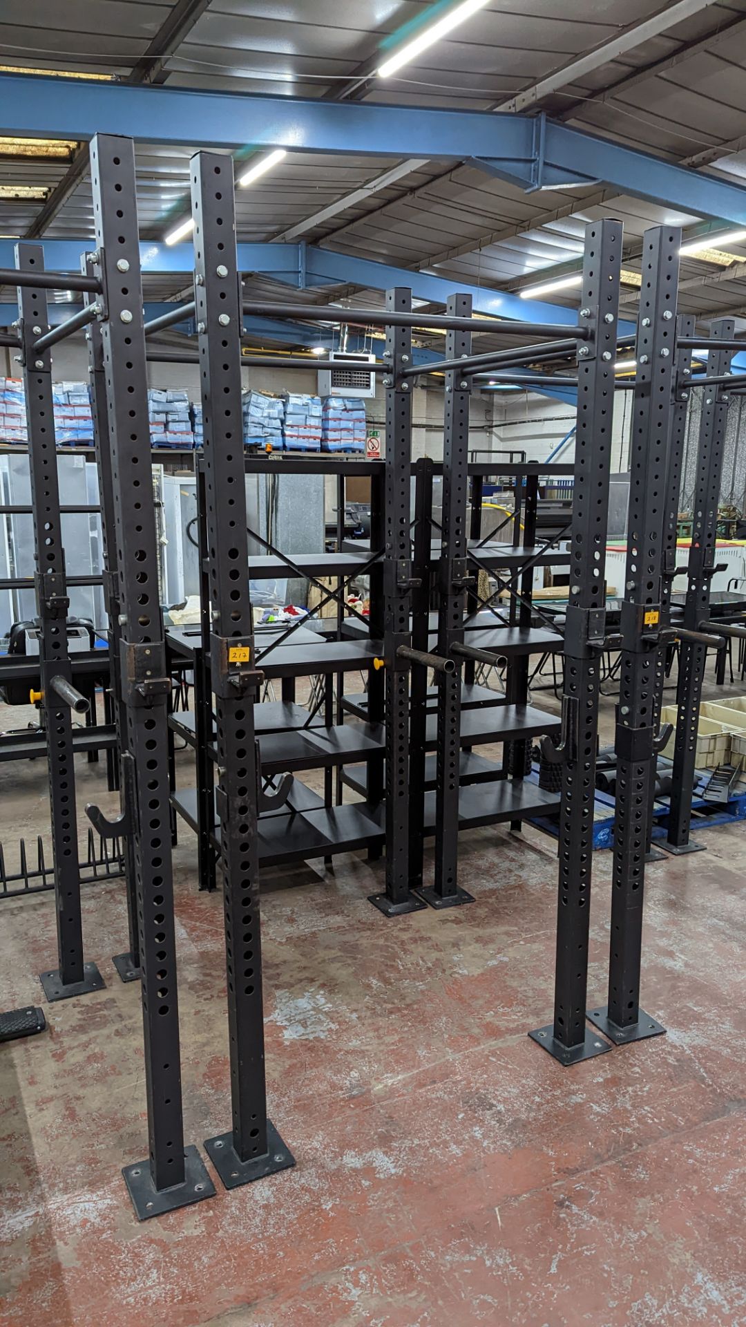 Power Rack comprising four vertical supports (each approximately 250 cms tall), four horizontal rods