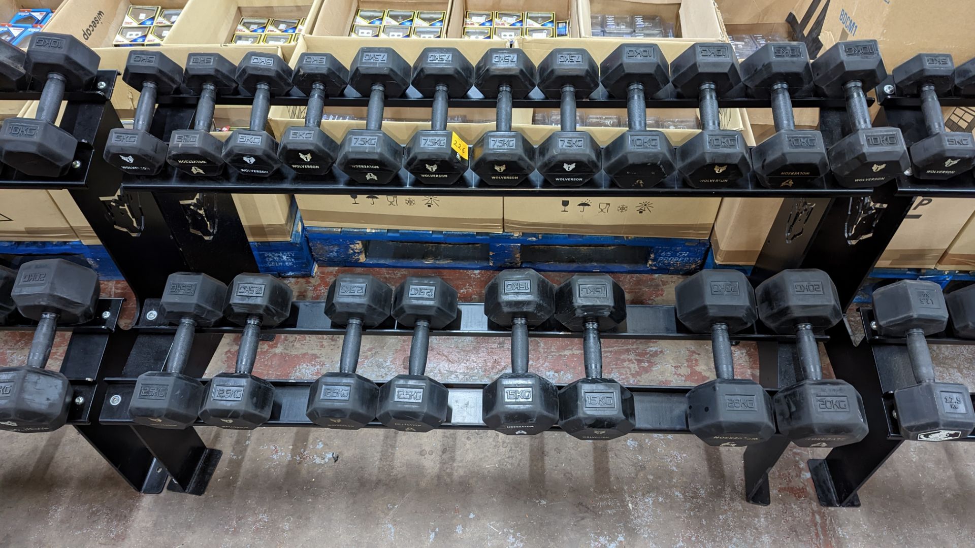 Rack and contents of Wolverson dumbbells. This lot comprises a two tier rack plus ten pairs of dumb