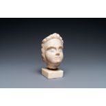 A Roman provicincial marble head of a boy, 2nd/3rd C.