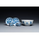 A Chinese blue and white bowl and a pair of cups and saucers, Kangxi