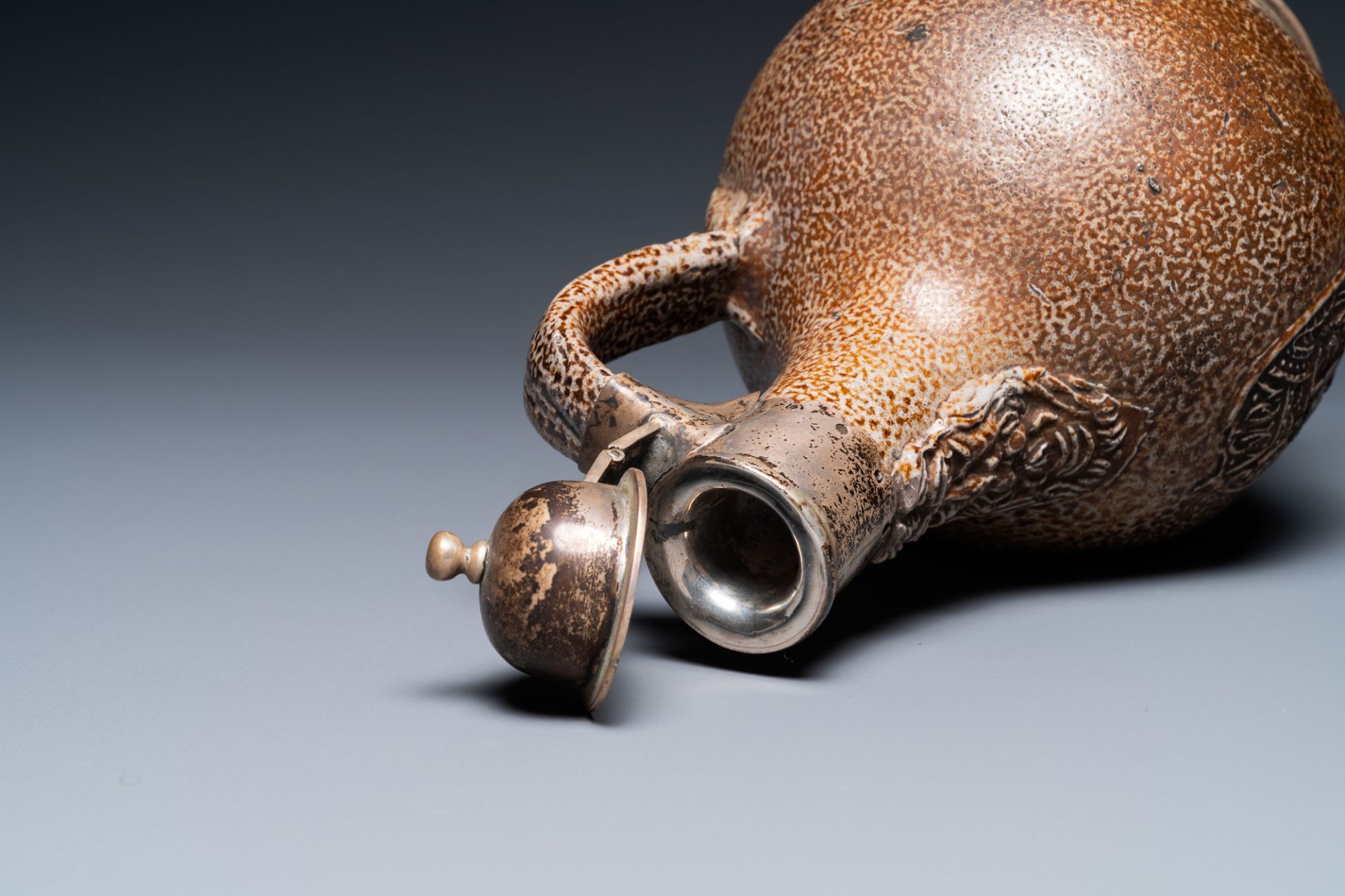 An English silver-mounted stoneware bellarmine jug, Raeren, 17th C. - Image 9 of 9
