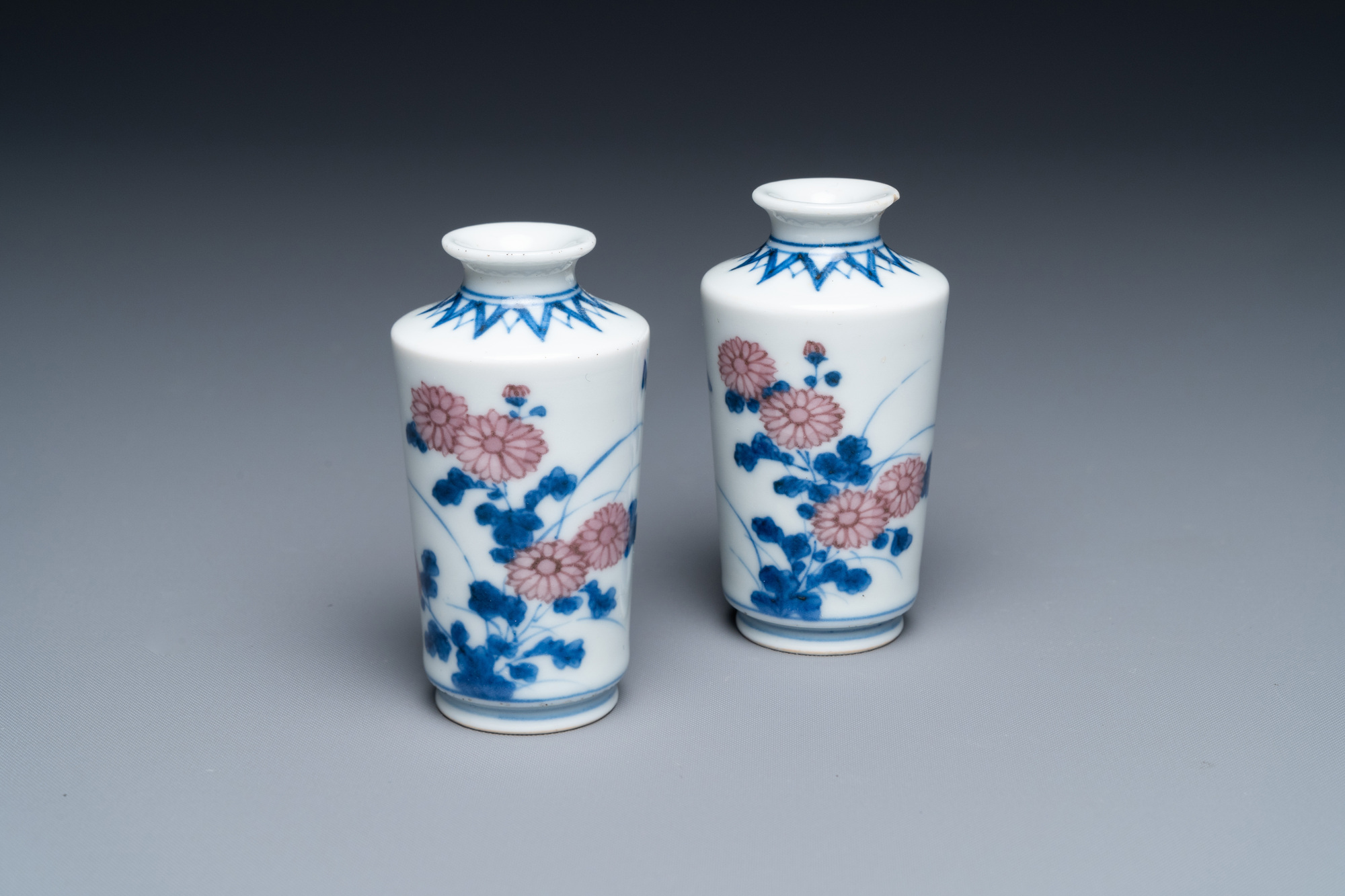 A pair of Chinese blue, white and copper-red miniature vases or snuff bottles, Qing Feng mark, 18/19