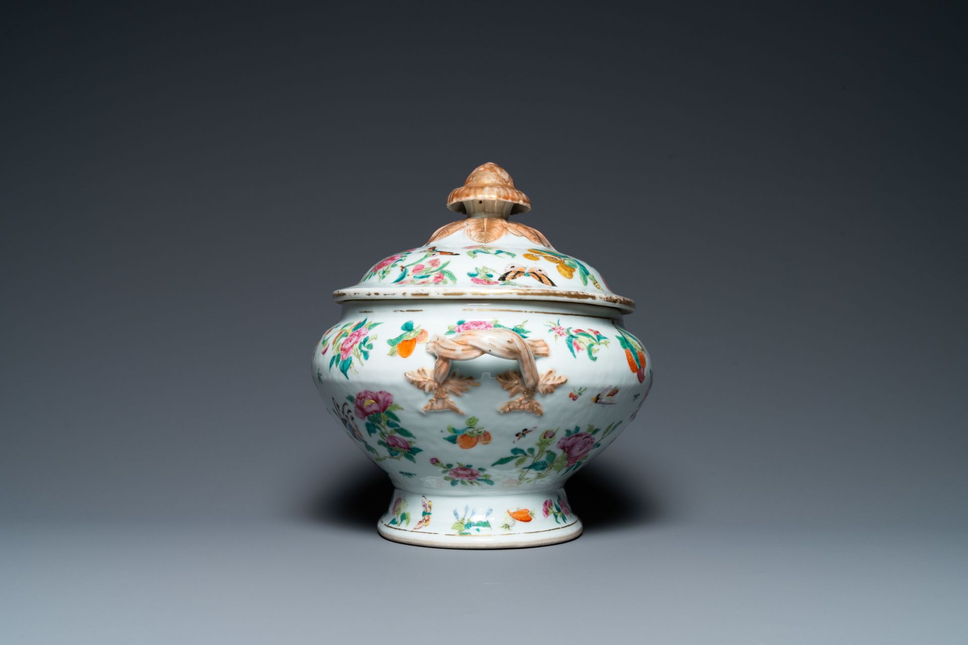 A Chinese Canton famille rose 'butterflies' tureen and cover on stand, 19th C. - Image 5 of 9
