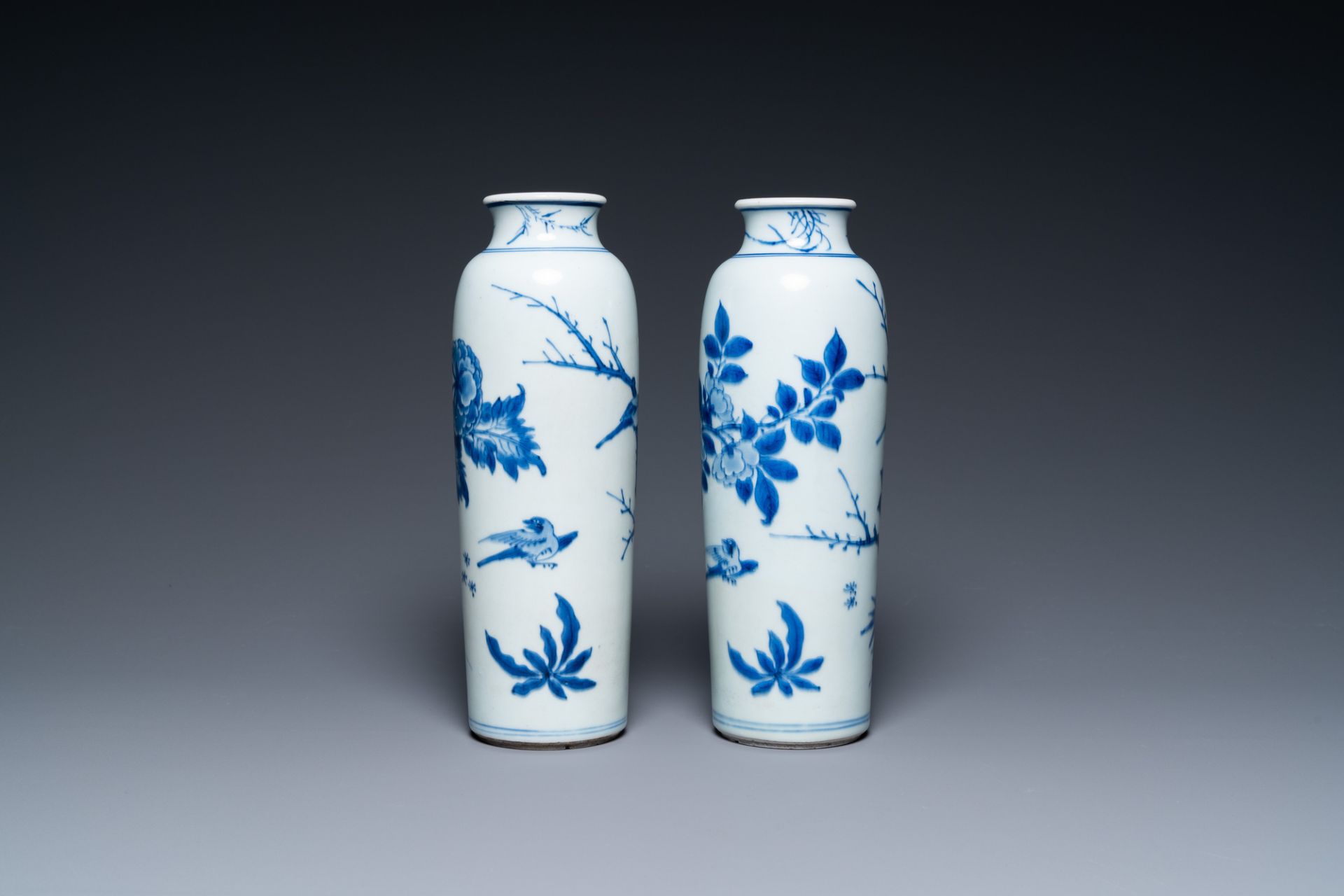 A pair of Chinese blue and white rouleau vases with birds among blossoming branches, Transitional pe - Image 2 of 6