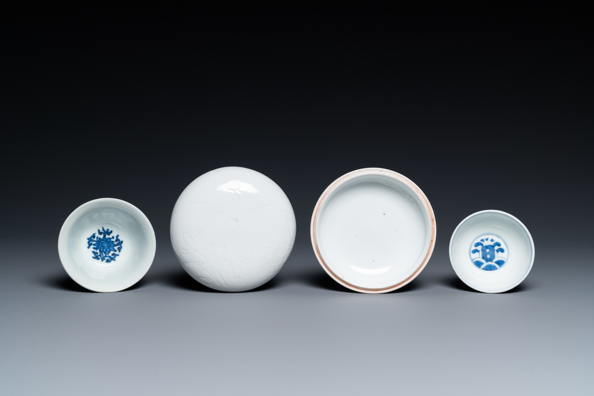 A Chinese white-glazed bowl, a small blue and white bowl and a covered box with incised design, Ming - Image 7 of 8