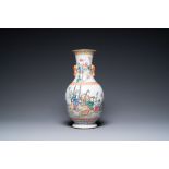 A Chinese famille rose 'deer carriage' vase, 19th C.