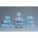 Twenty-one Chinese blue and white saucers and eighteen cups, Kangxi