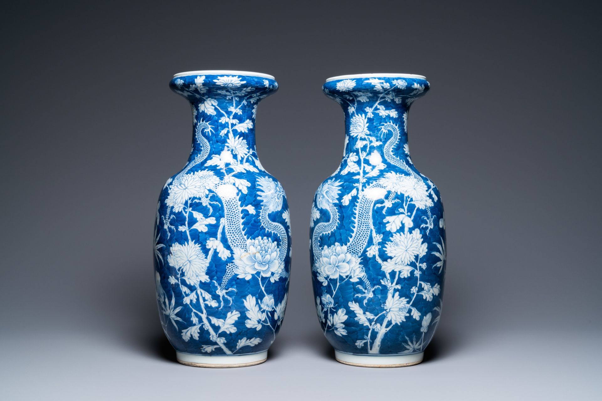 A pair of Chinese blue and white 'dragon and peony' vases, 19th C. - Image 4 of 21