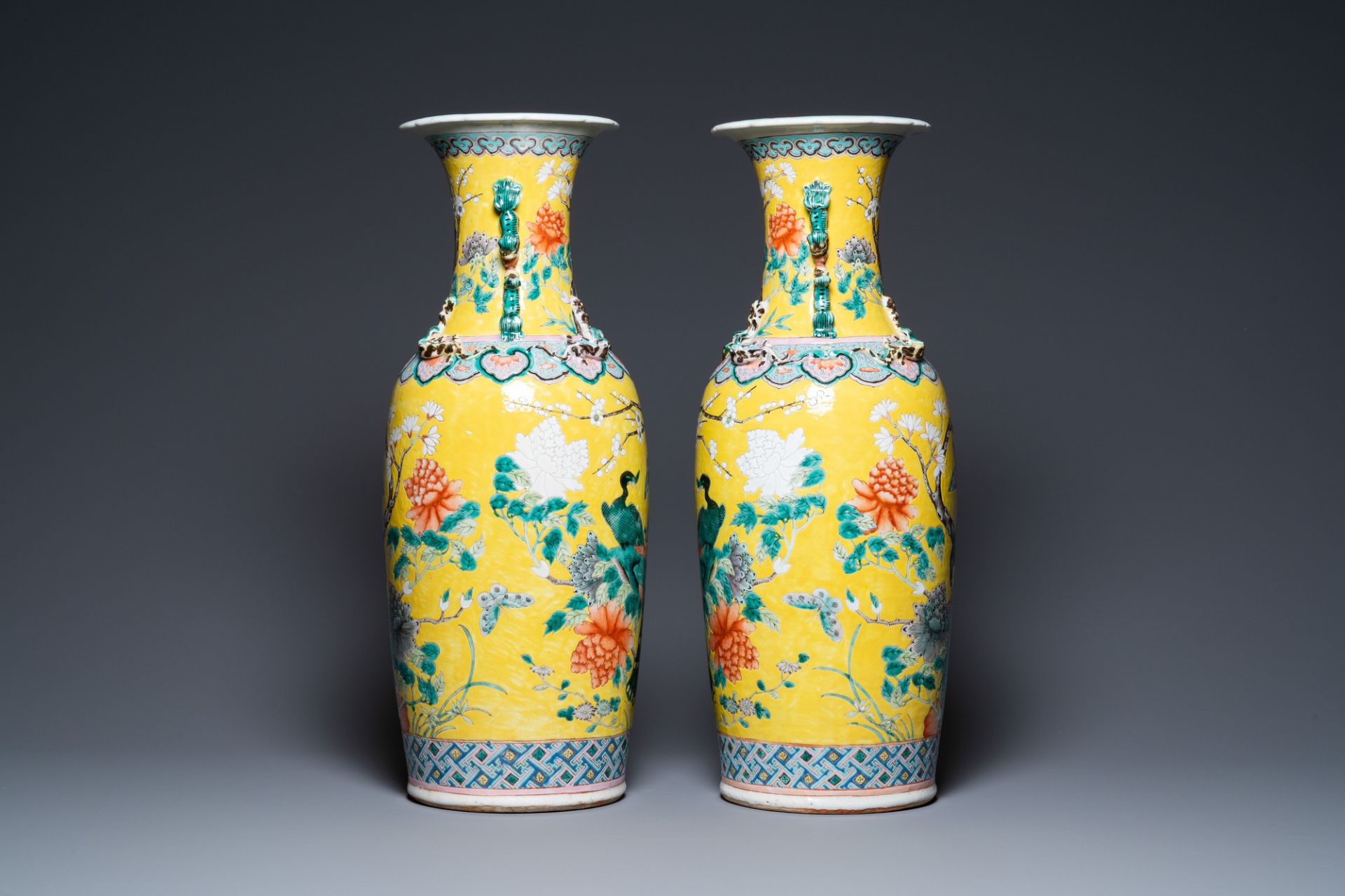 A pair of Chinese yellow-ground famille rose vases, 19th C. - Image 2 of 6