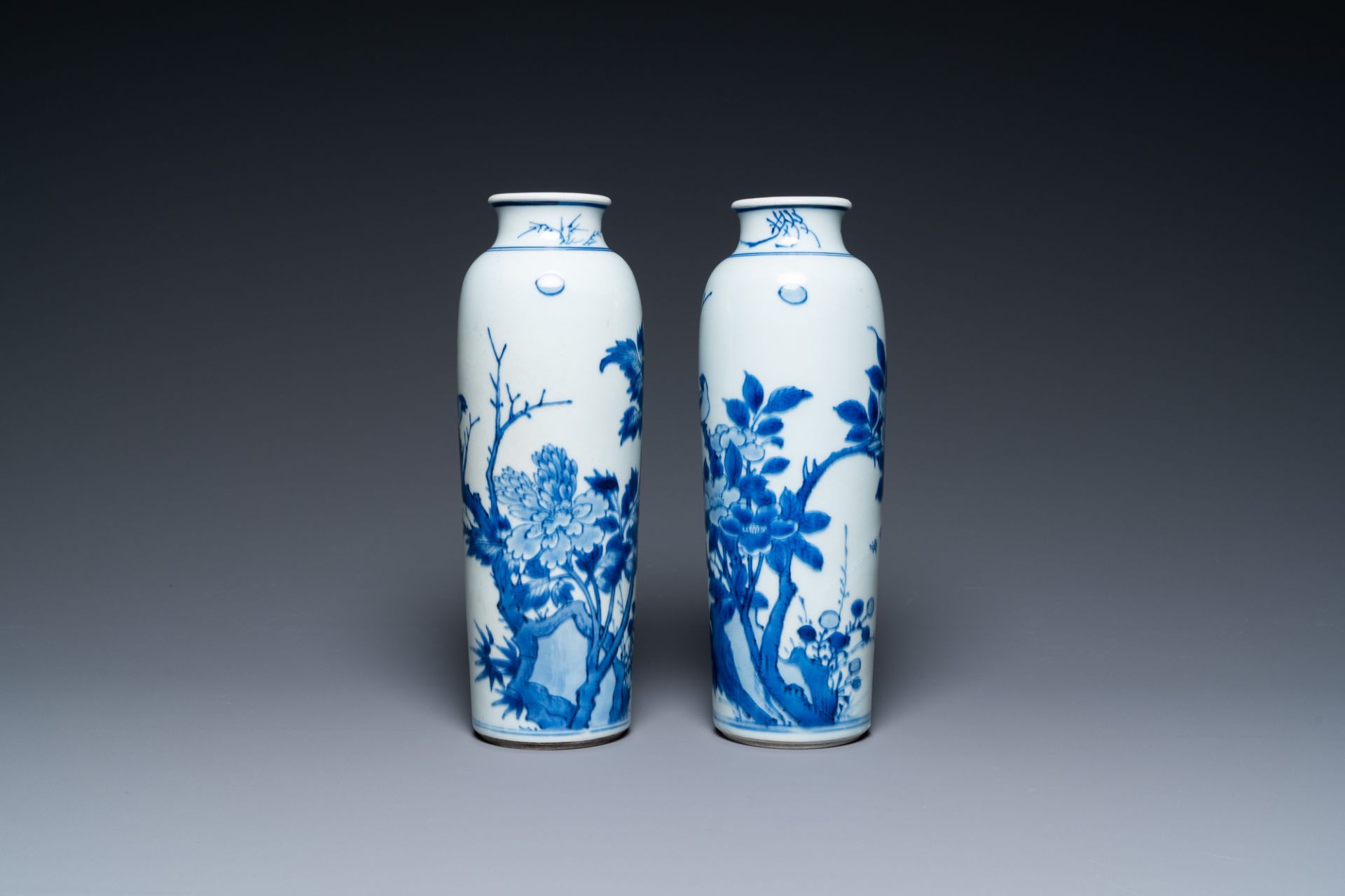 A pair of Chinese blue and white rouleau vases with birds among blossoming branches, Transitional pe - Image 4 of 6