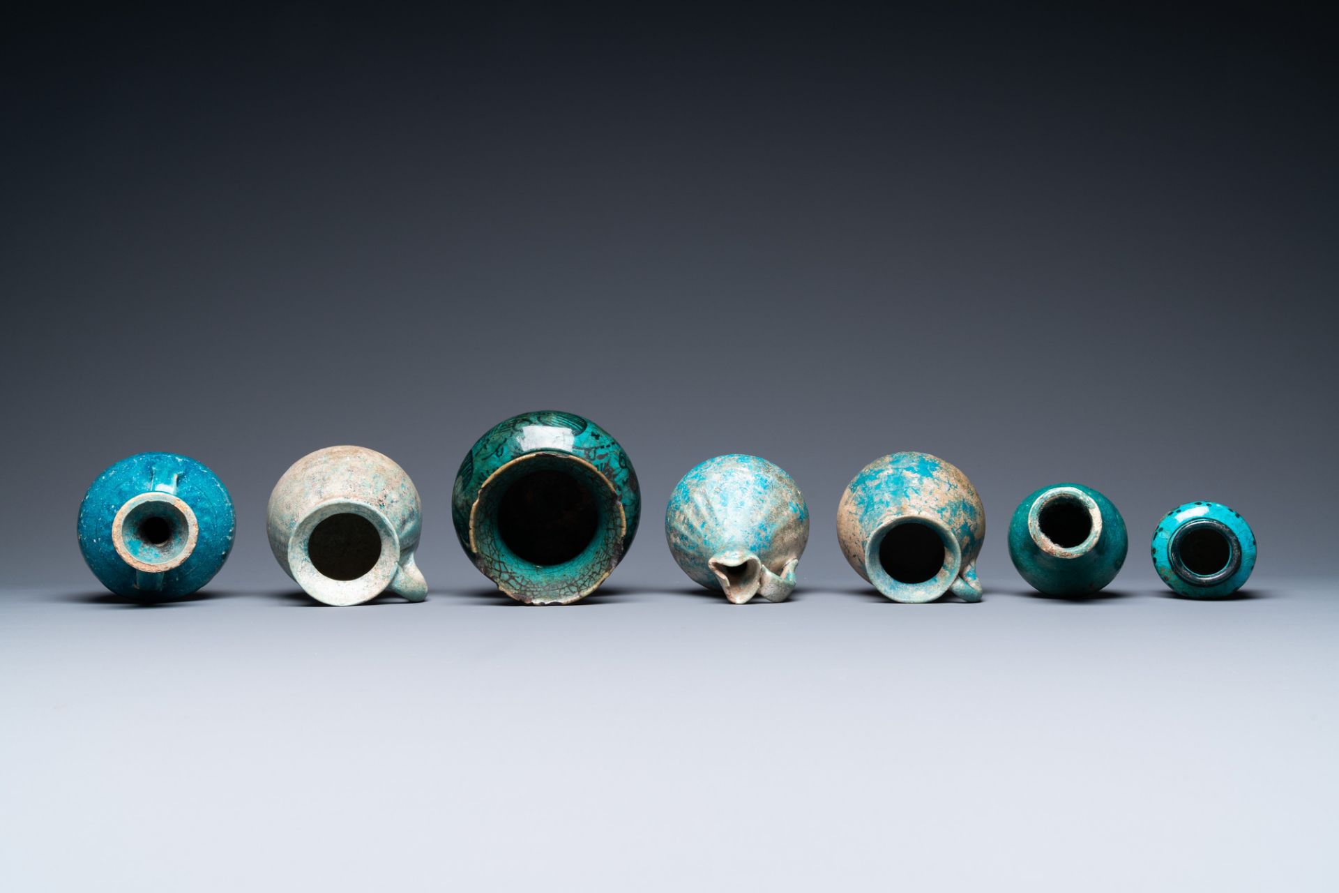 A collection of seven turquoise-glazed jugs and vases, Middle-East, 13th C. and later - Image 6 of 7
