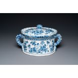 A Dutch Delft blue and white tureen and cover with putti, 17/18th C.