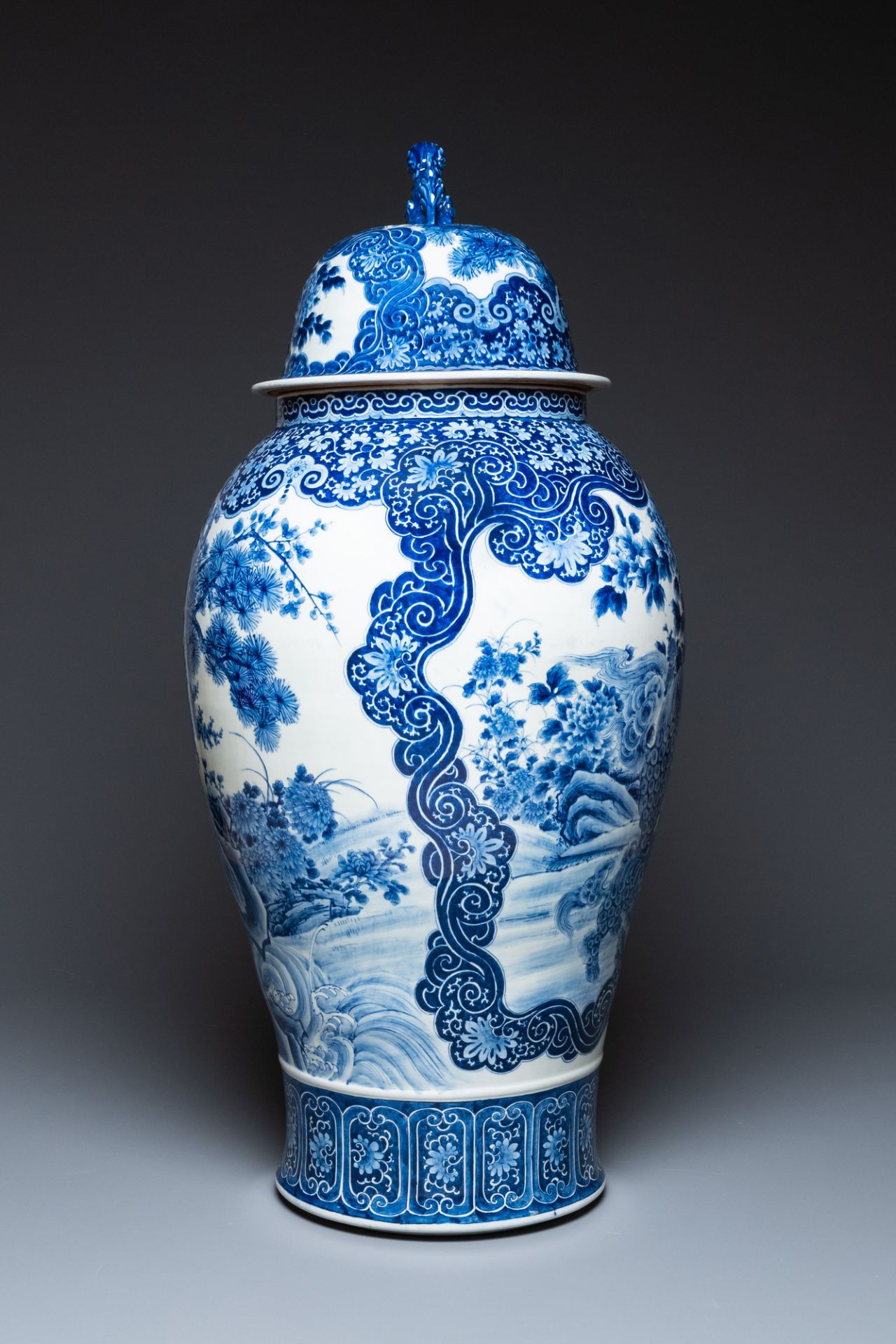 A massive Japanese blue and white Seto vase and cover with shishi and an eagle, Meiji, 19th C. - Image 2 of 6