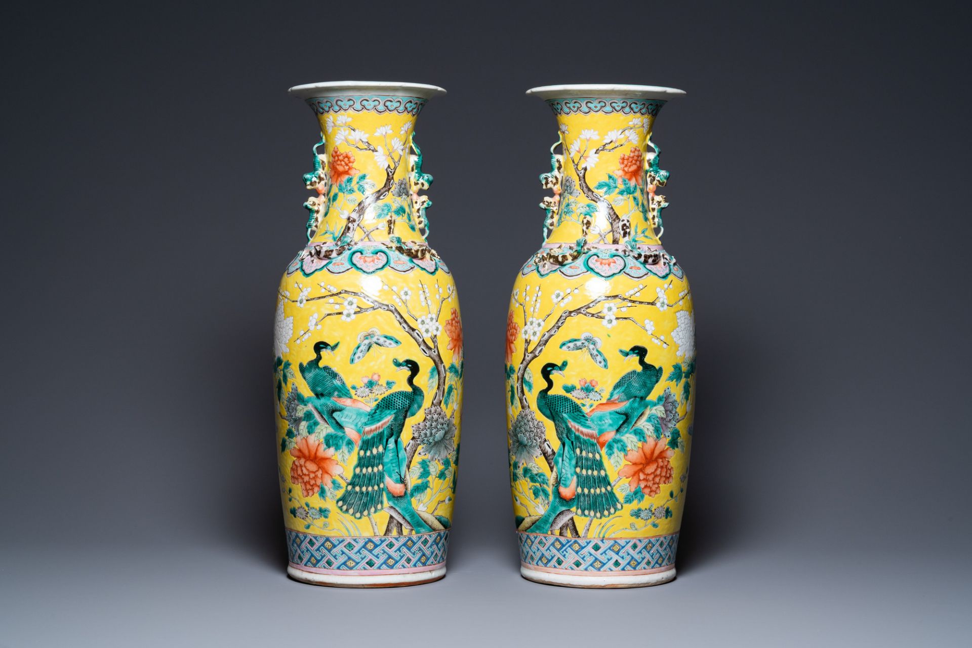 A pair of Chinese yellow-ground famille rose vases, 19th C. - Image 3 of 6