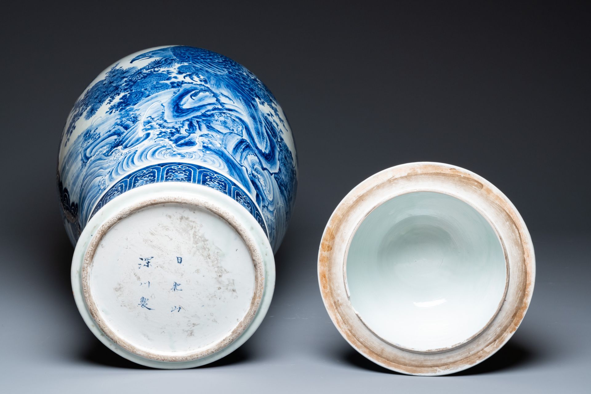 A massive Japanese blue and white Seto vase and cover with shishi and an eagle, Meiji, 19th C. - Image 6 of 6