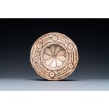 An Eastern Roman or Byzantine pottery dish with ornamental design, 6/10th C.