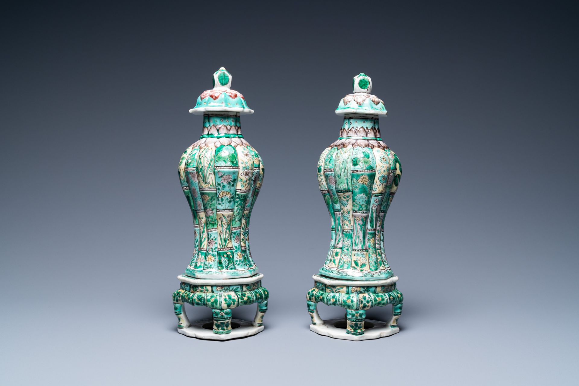 A pair of Chinese verte biscuit vases and covers on stands, Kangxi - Image 3 of 6