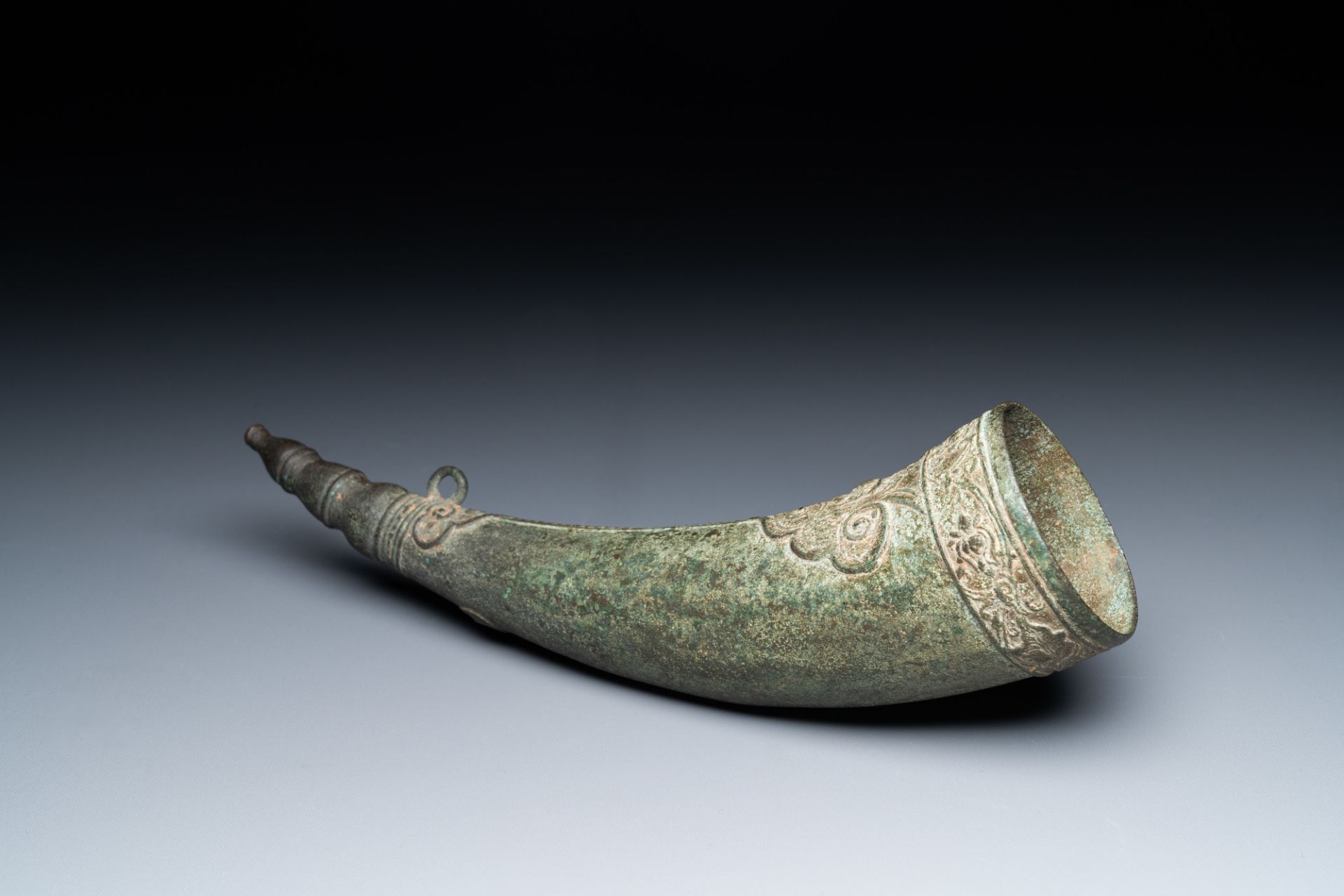 A Vietnamese bronze 'Oliphant' horn or rhyton, L or M_c dynasty, 15/16th C.