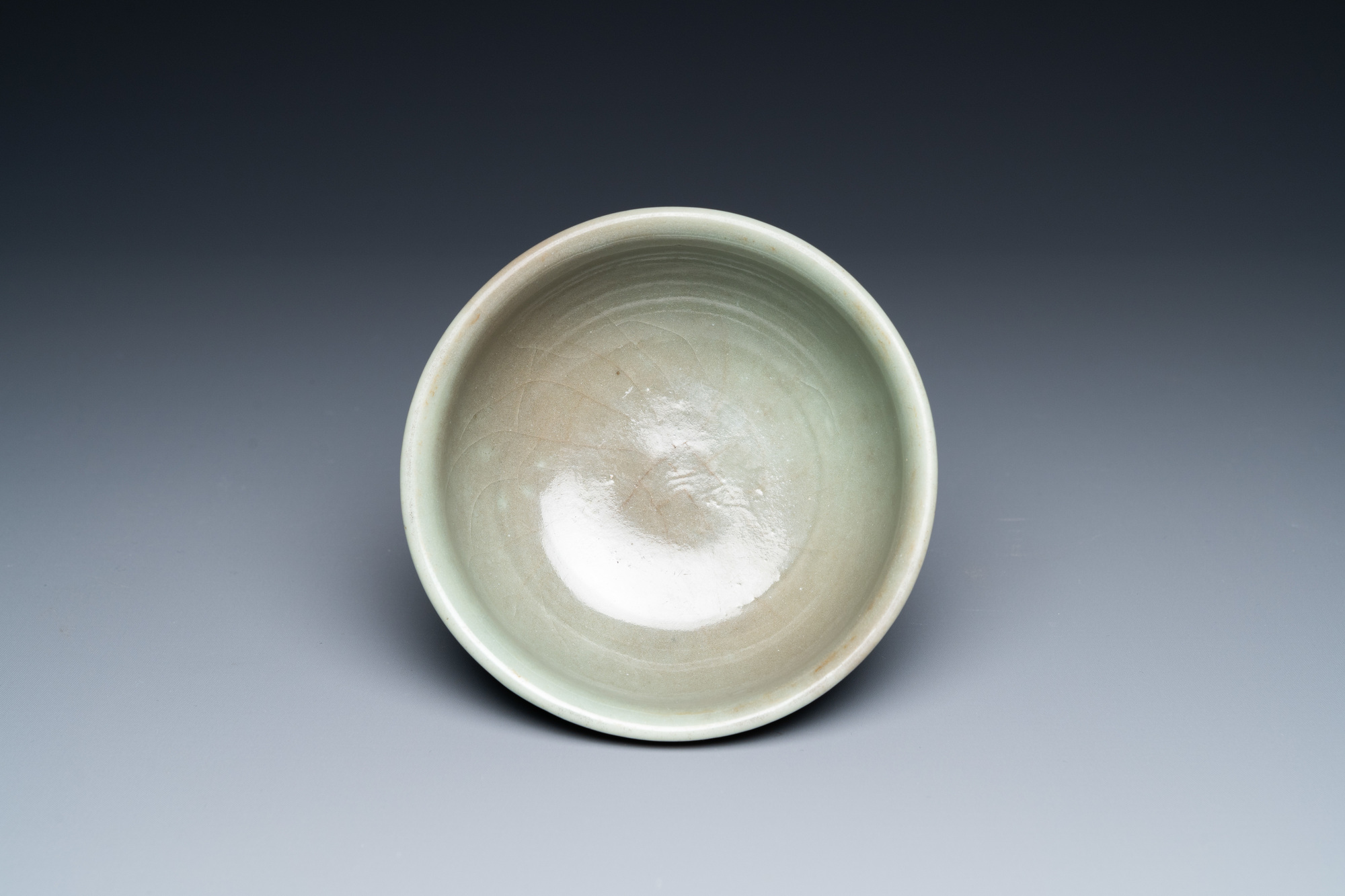 A Chinese Longquan celadon stem cup with underglaze design, Ming - Image 6 of 7