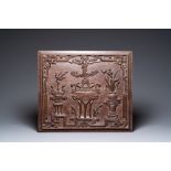 A Chinese carved wooden 'antiquities' panel, 19th C.