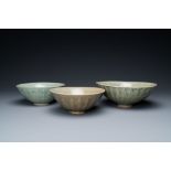 Three Chinese celadon-glazed 'lotus' bowls, Song