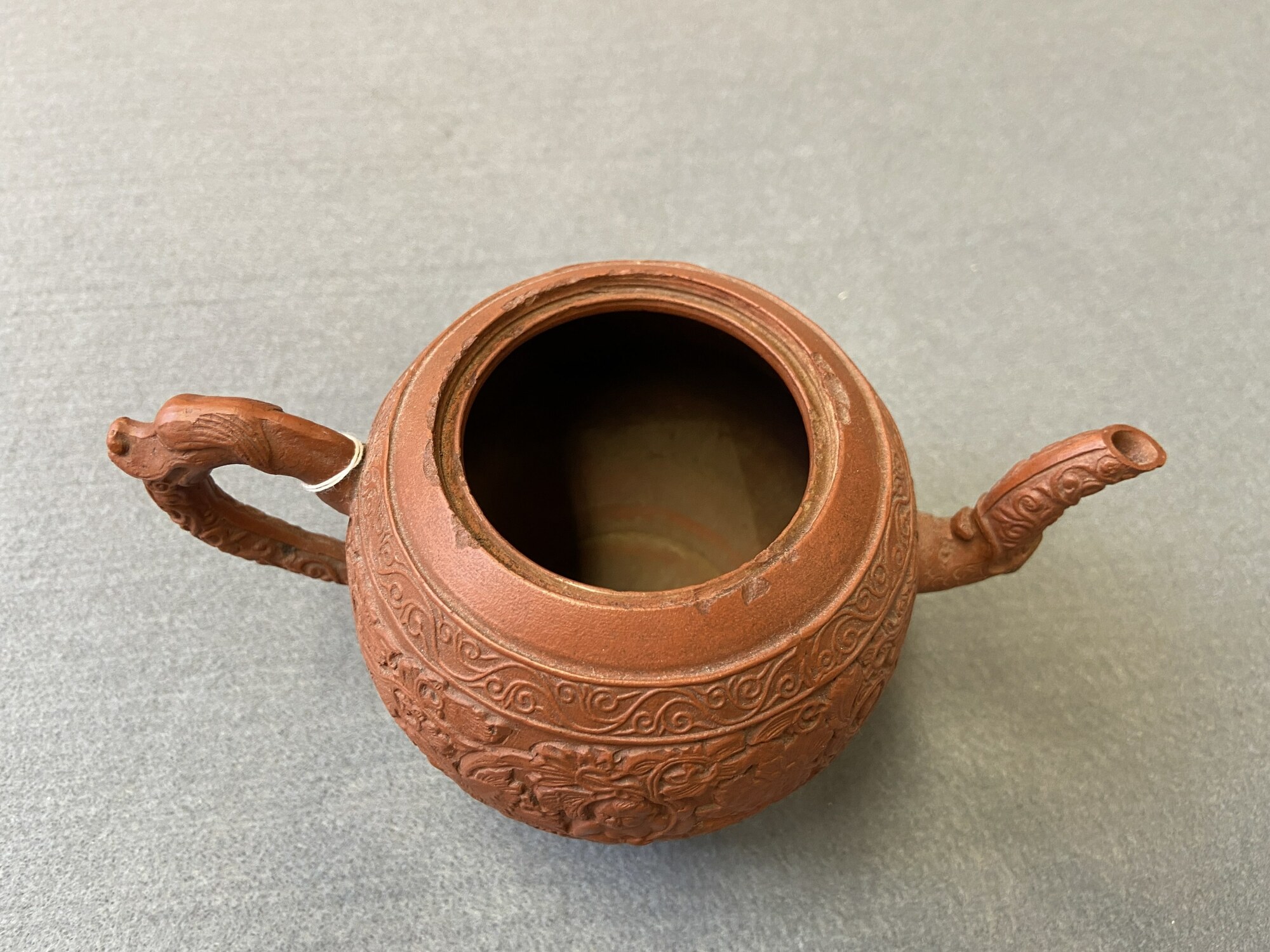 A Chinese Yixing stoneware teapot with boys among peony scrolls, Kangxi - Image 13 of 23