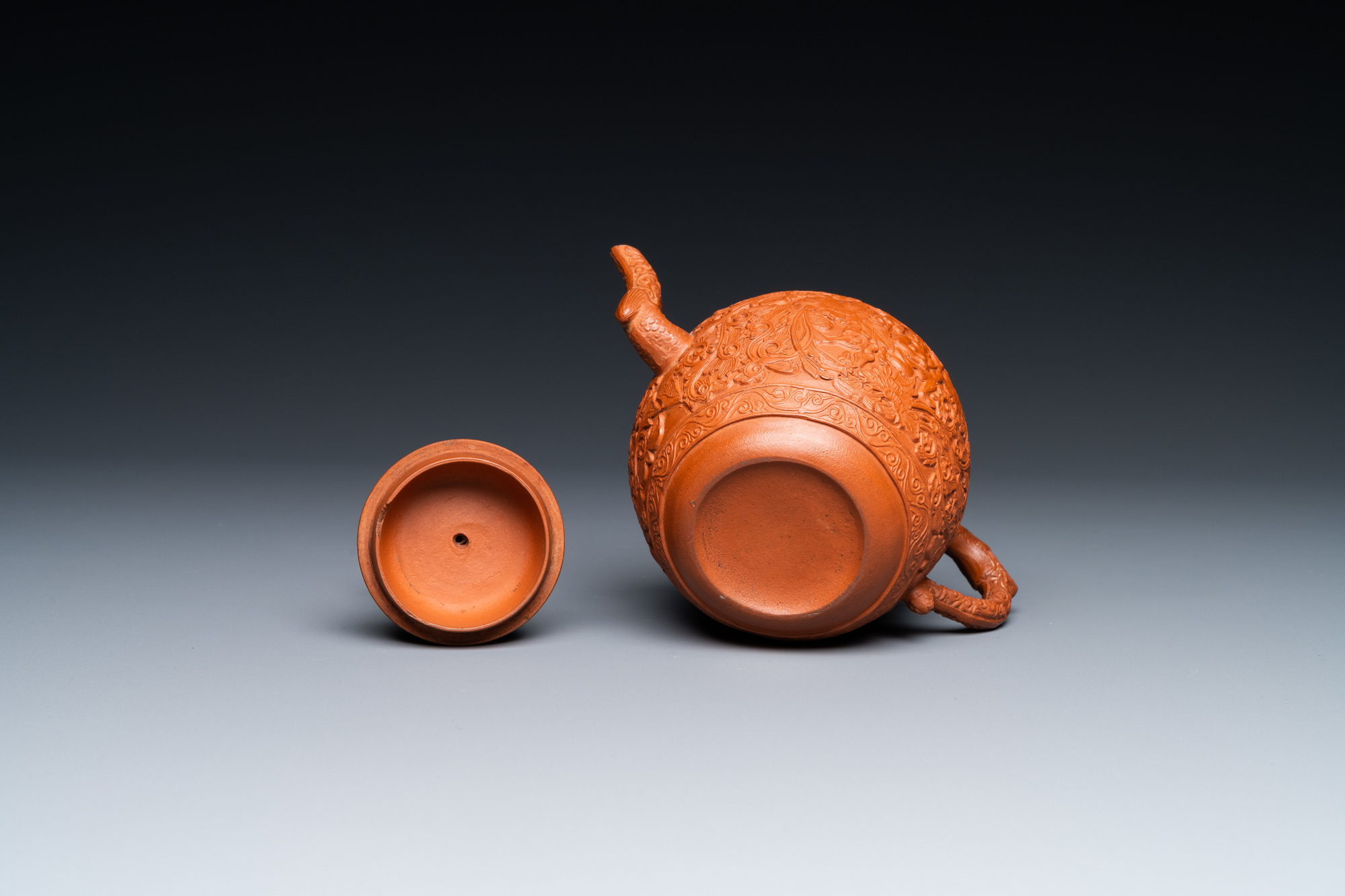 A Chinese Yixing stoneware teapot with boys among peony scrolls, Kangxi - Image 7 of 23