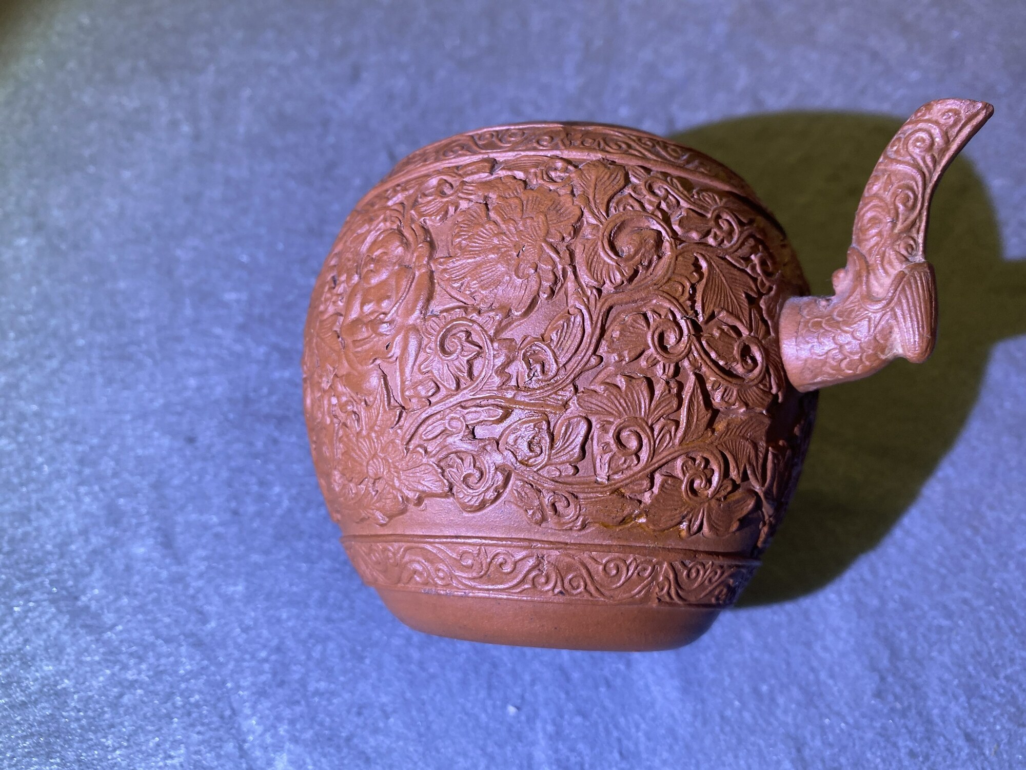 A Chinese Yixing stoneware teapot with boys among peony scrolls, Kangxi - Image 19 of 23