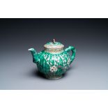 A Chinese ribbed verte biscuit teapot and cover, Kangxi