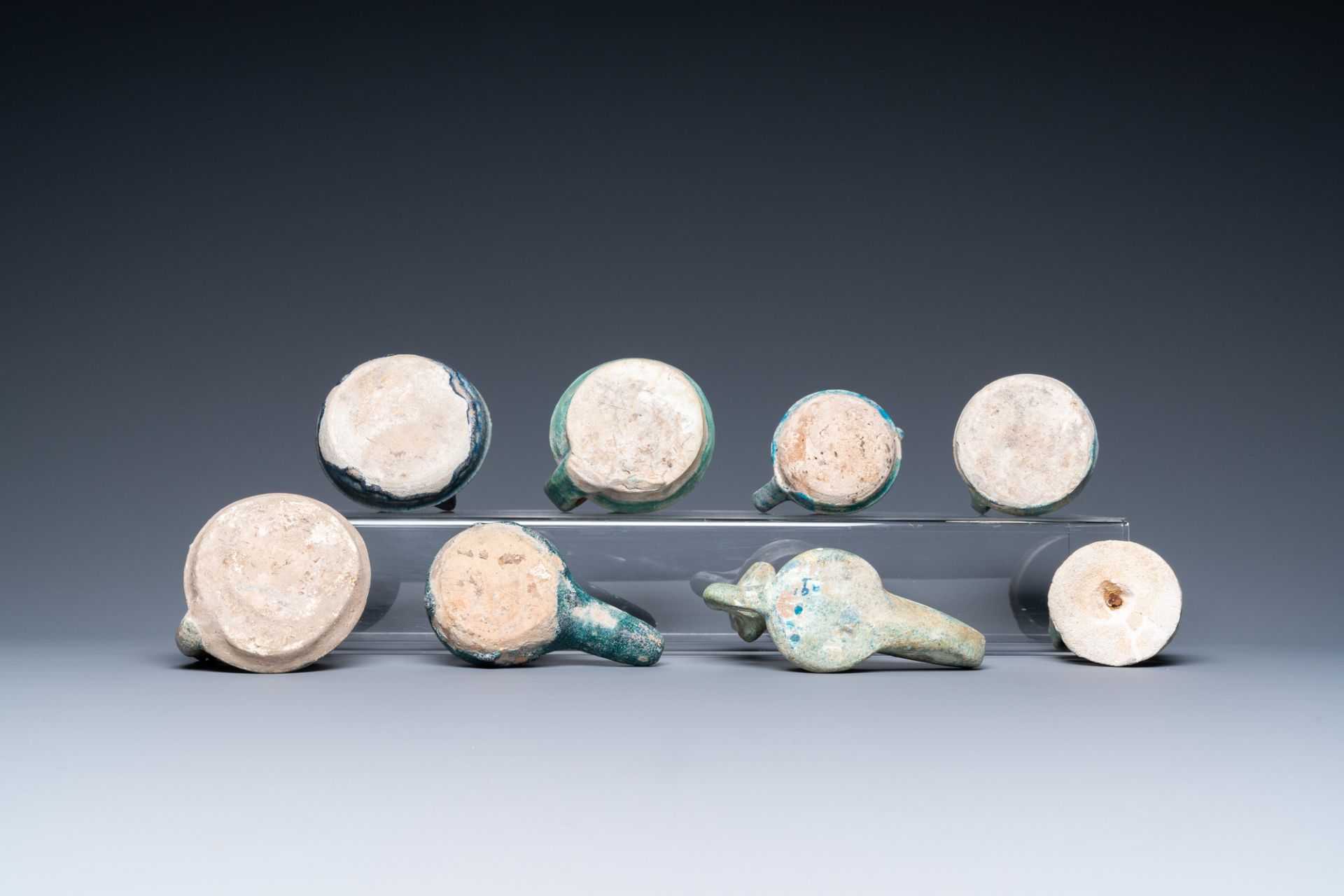 Eight turquoise-glazed oil lamps, Middle-East, 13th C. and later - Image 7 of 7