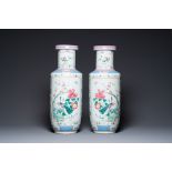 A pair of Chinese famille rose rouleau vases, 19th C.